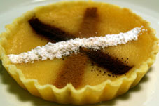 Lemon tart with flavoured stripes